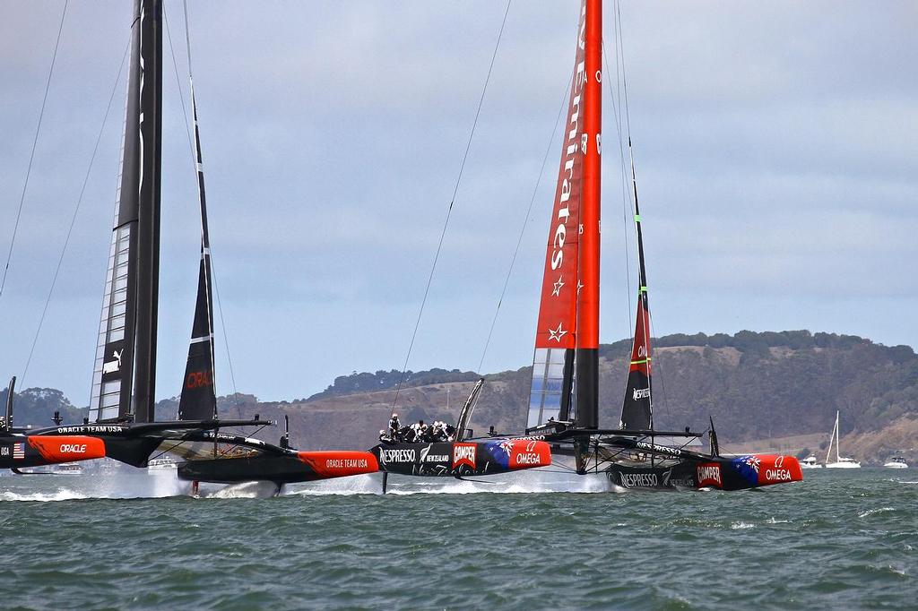 Oracle Team USA v Emirates Team New Zealand. America’s Cup Day 3, San Francisco. Emirates Team NZ  to leeward of Oracle Team USA on the first reach © Richard Gladwell www.photosport.co.nz